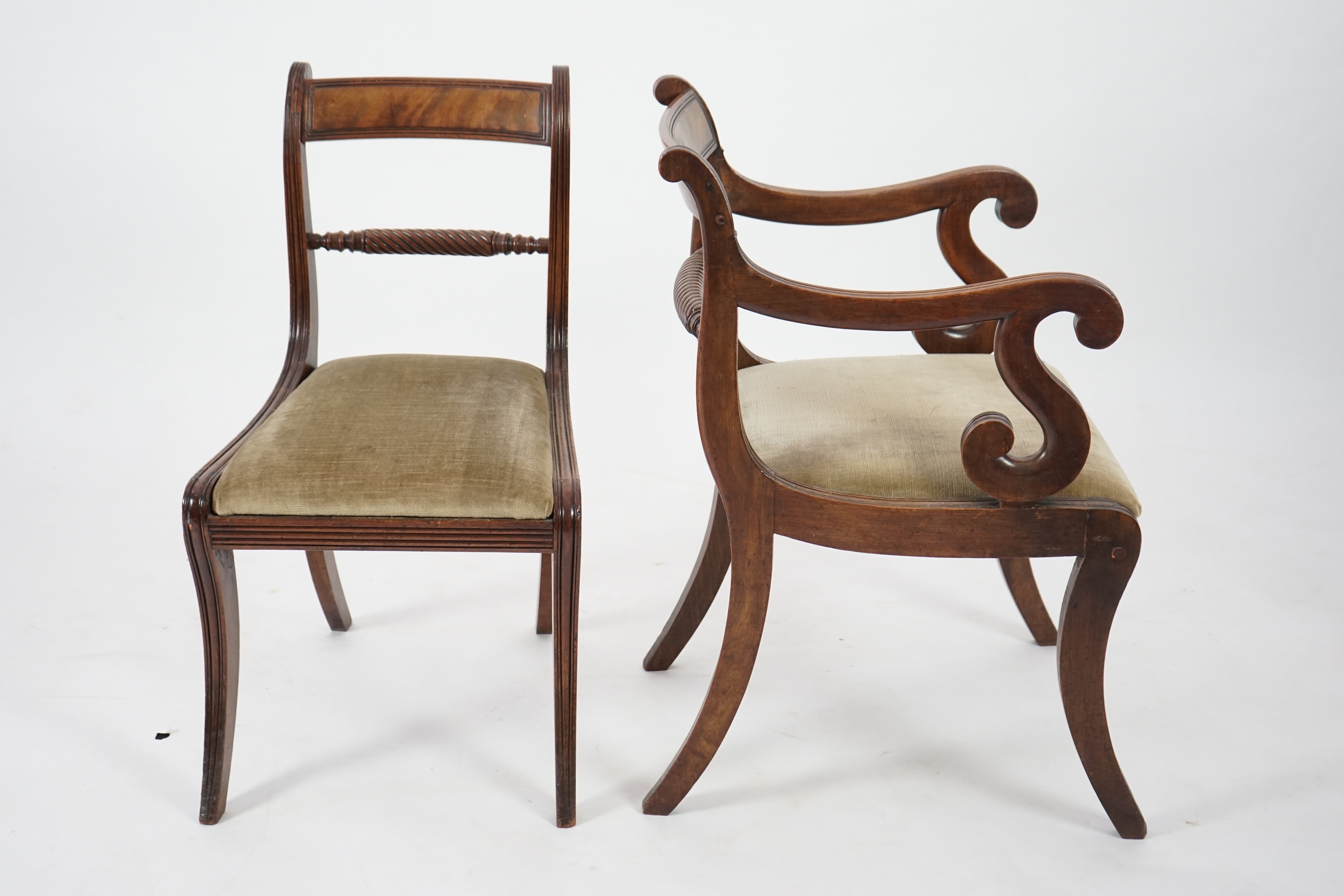 A set of ten Regency mahogany dining chairs, including a pair of carvers